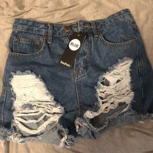 High waist distressed jean shorts. Size 8